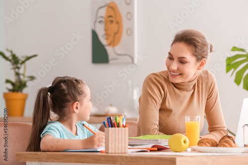 Working mother with little ...