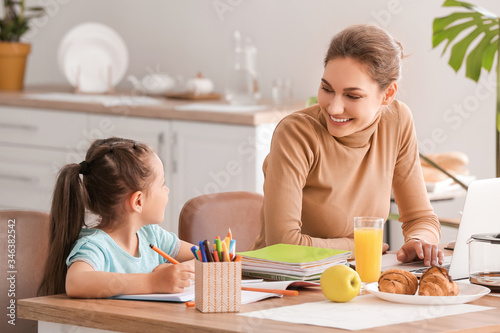 Working mother with little ...