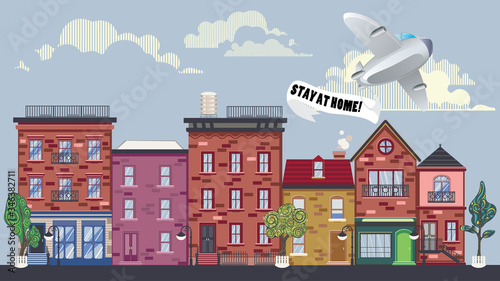 Airplane with stay at home banner over town