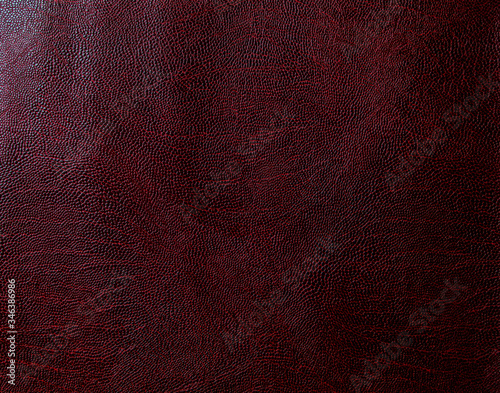 Maroon faux leather. Artificial leather texture