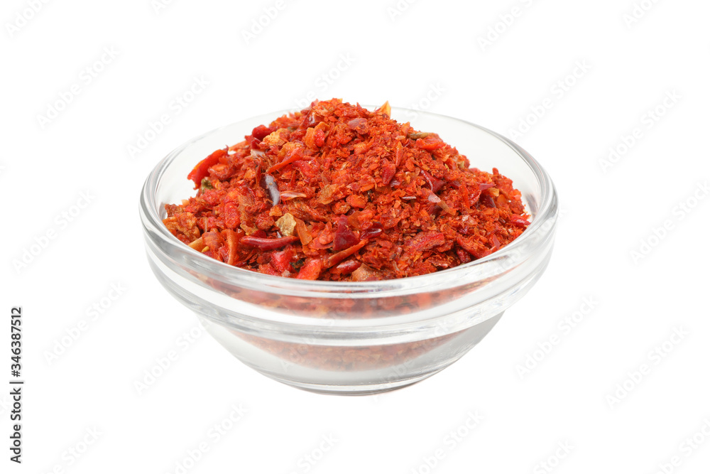 Bowl with pepper powder spice isolated on white background