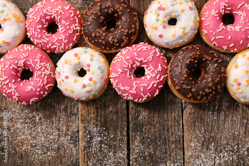 assorted of donut on wood background