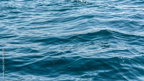 Blue seawater surface with small waves. Torrox Costa