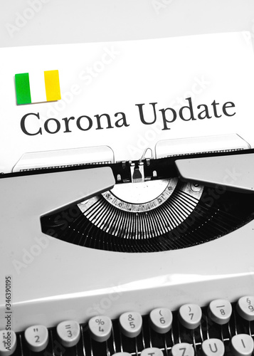 A Typewriter Typing the NEWS of COVID-19 with the Flag of Ireland.