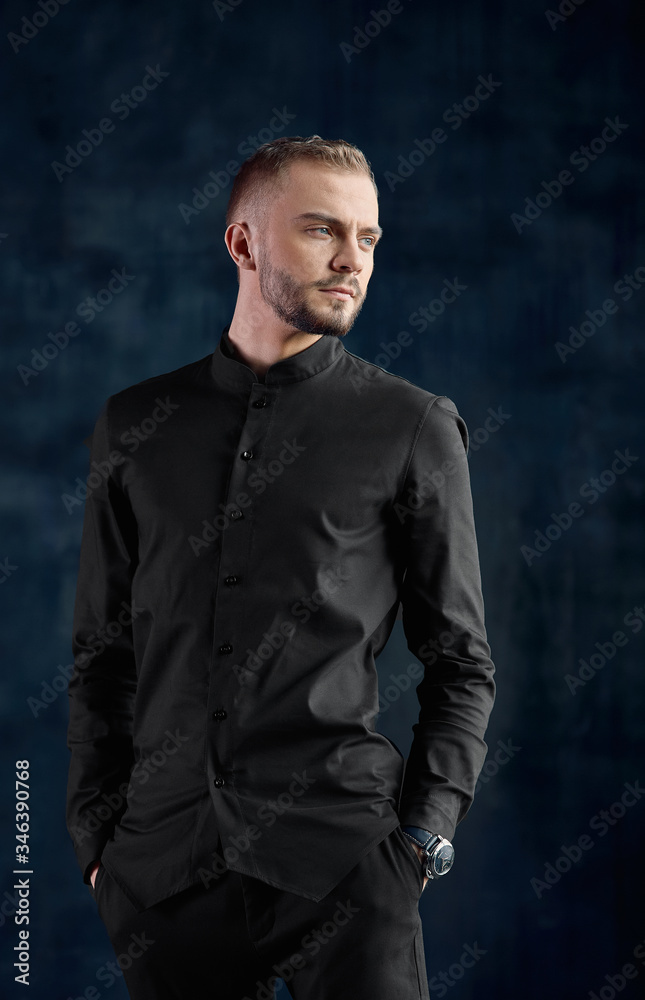 Elegant young handsome modern man. Fashion portrait studio, fashion, successful man. copy space, dark background. Elegant young handsome modern man. Fashion portrait studio, fashion, successful man. copy space, dark background.