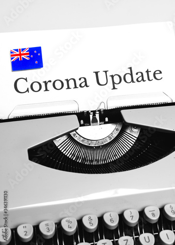 A Typewriter Typing the NEWS of COVID-19 with the Flag of New Zealand.