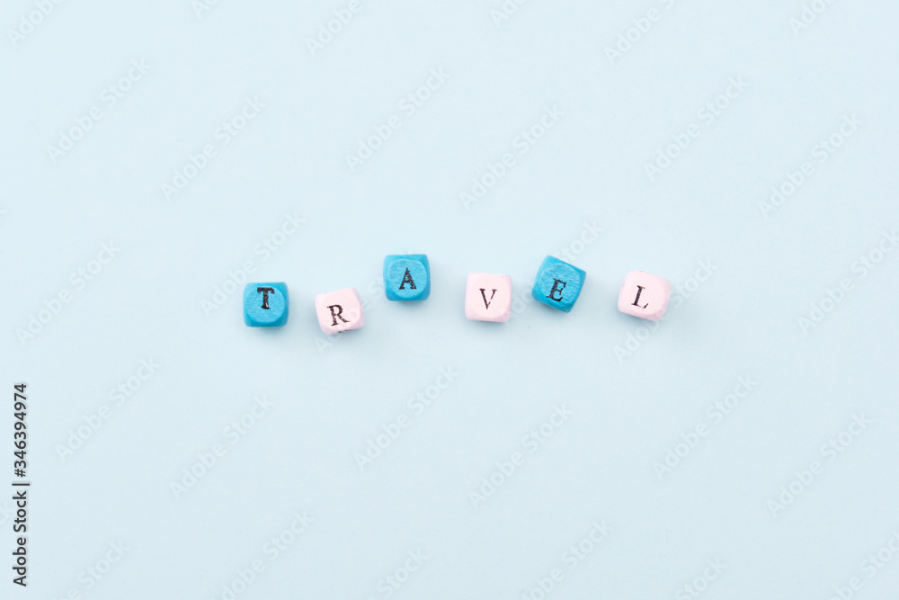Travel word on wooden blocks