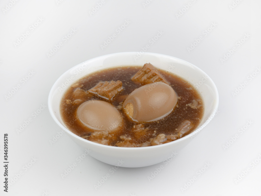 Egg and Pork in Sweet Brown Sauce(Khai Palo)Egg on white background, stewed eggs in brown sauce by Thai food Egg and Pork in Sweet Brown Sauce(Khai Palo)Egg on white background, stewed eggs in brown sauce by Thai food