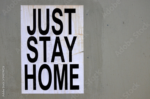Картината върху платно Just Stay Home sign on a concert wall