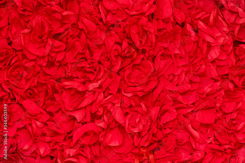 Fototapeta premium Red rose petals texture for background and design. Flower background