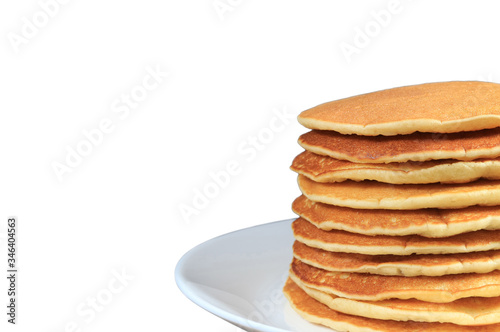 Stack of homemade plain pancakes on a white plate isolated on white background	