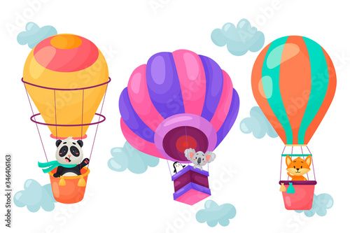 Vector set of cartoon animals flying on air balloons. Cute character design of balloons in the clouds. Vector illustration on white isolated background.