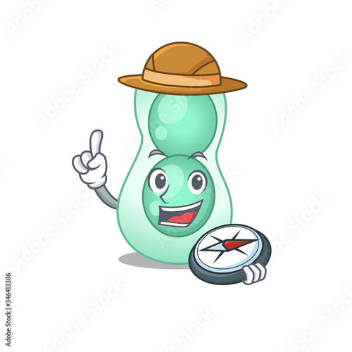 mascot design concept of serratia marcescens explorer with a compass