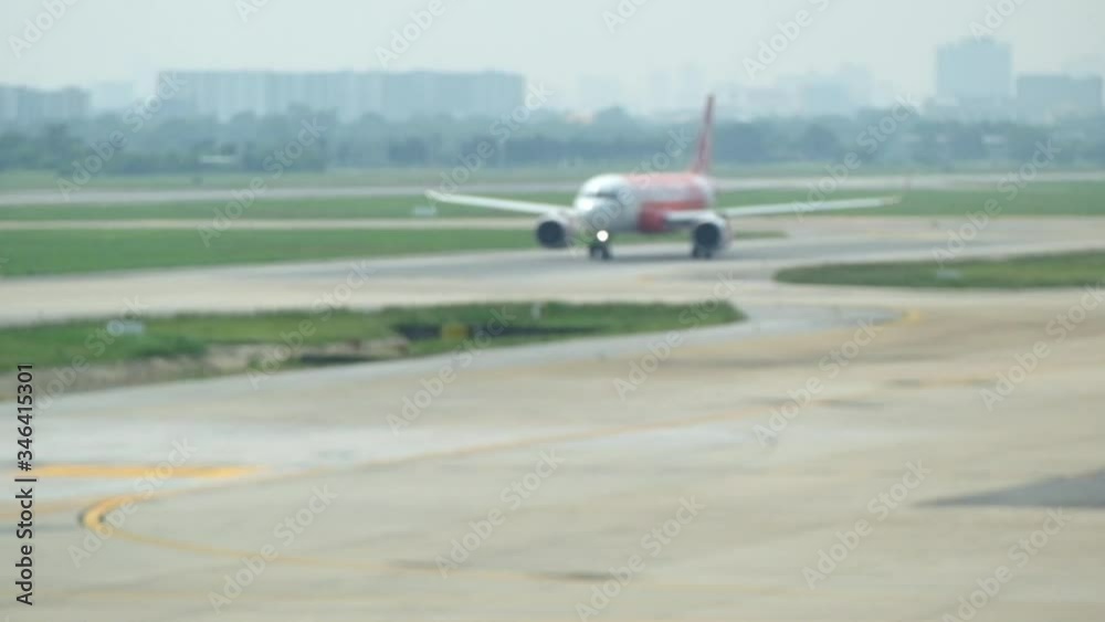 Blurred and unrecognizable Airplane prepares for take off at the airport.
Blurred and unrecognizable Airplane prepares for take off at the airport.