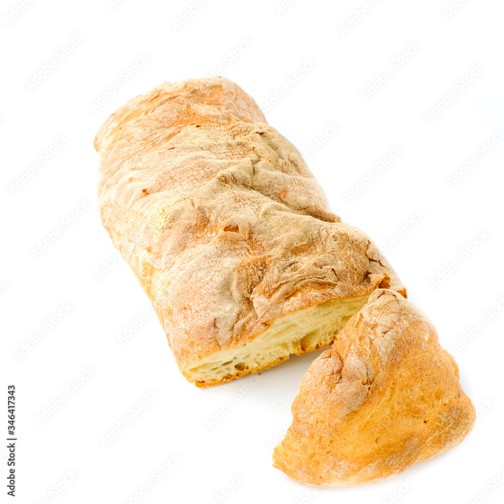 Closeup France long bread slice isolated on white background, top view of healthy bakery 