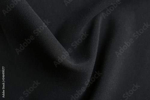 Texture of beautiful black fabric as background, closeup