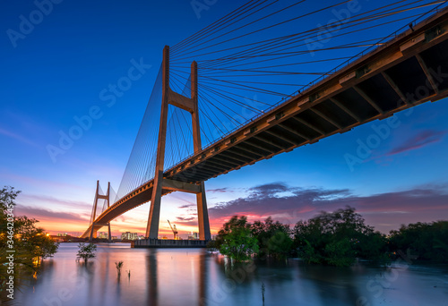 Beautiful sunset landscape at Phu My Bridge. This largest cable-stayed bridge crossing Saigon river connect District 2 and 7 in Ho Chi Minh City, Vietnam