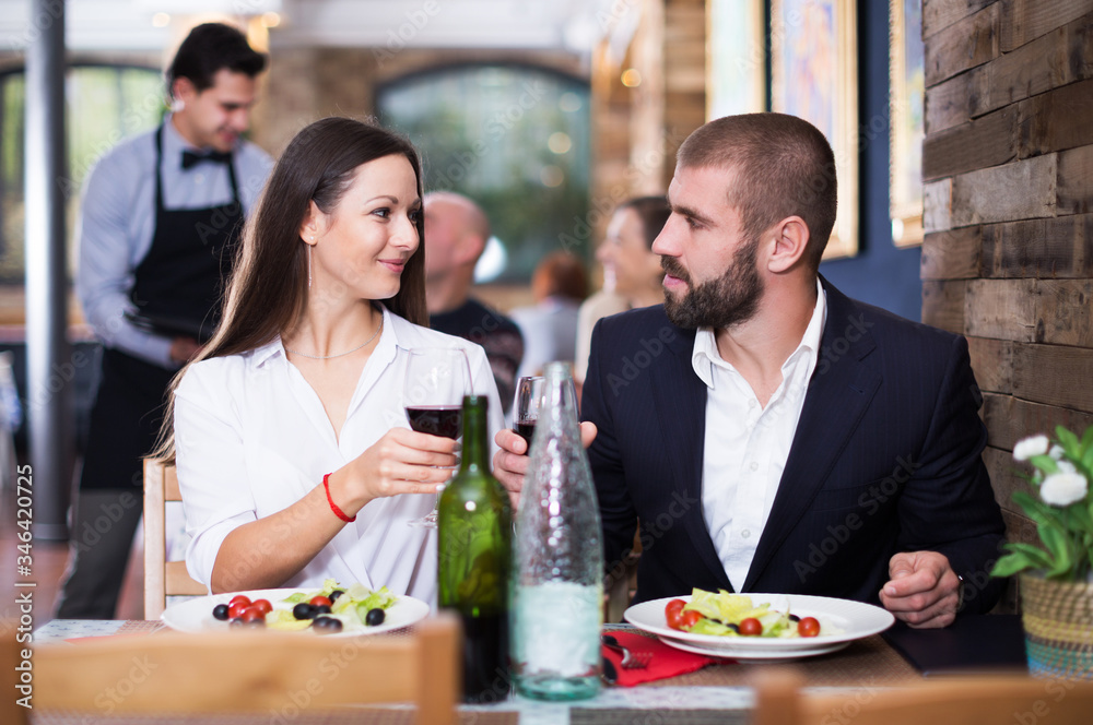 couple in the restaurant with alcohol drinks