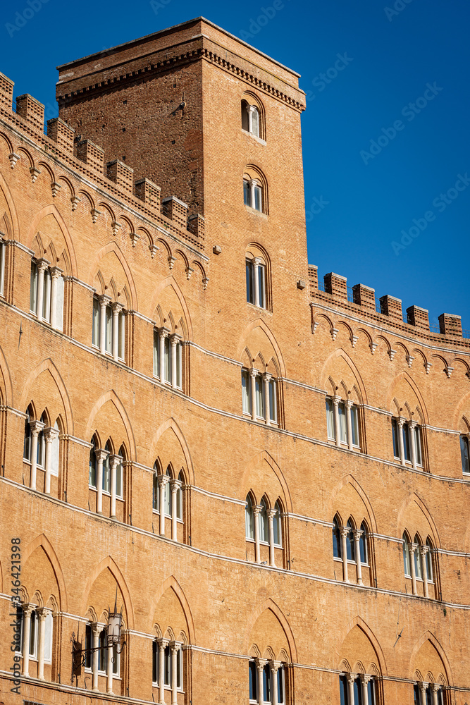 Palazzo Sansedoni, ancient medieval palace (XIII century) in Piazza del Campo, the main town square of Siena, Tuscany, Italy, Europe