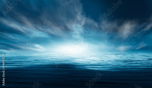 Night seascape. Dark landscape with a marine background and sunset, moon. Abstract night landscape in blue light. Reflection of the moon in the night water. Empty futuristic landscape.