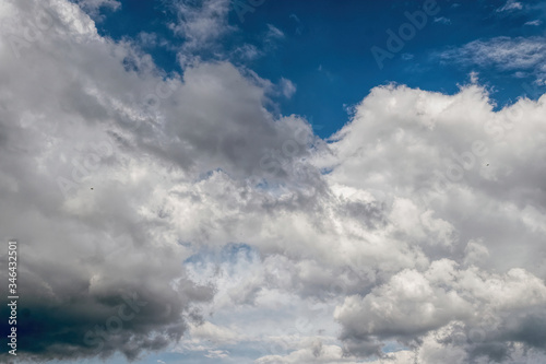 Natural background. Gray and blue spring stormy clouds