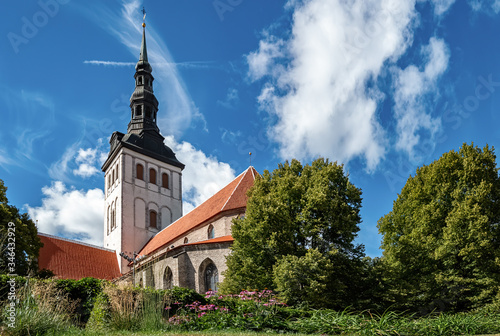 View of St. Nicholas Church and Museum Niguliste in old town of Tallinn, Estonia on sunny day in summer. photo