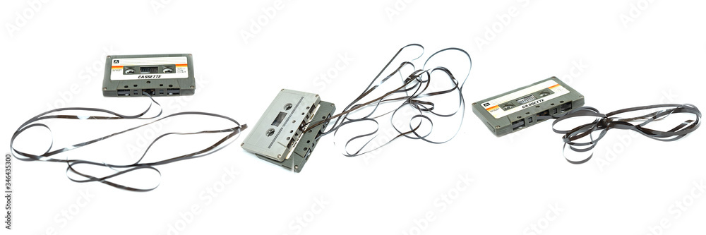 Close up the collection of old cassette tape compact on white background Close up the collection of old cassette tape compact on white background