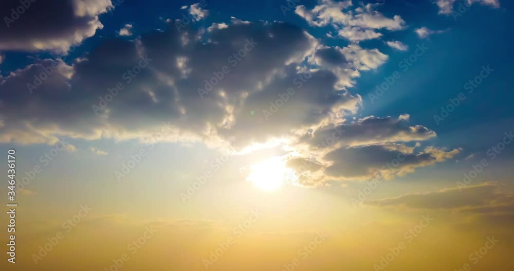 Time lapse of dramatic sunset sky with fading sun and colorful clouds. 4K timelapse video clip Time lapse of dramatic sunset sky with fading sun and colorful clouds. 4K timelapse video clip