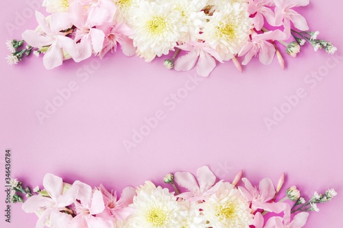 beautiful mix flowers frame on soft pink romance background