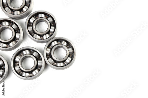 Top view Set of various metal rolling bearing spare part of mechanical on white background. Have copy space.