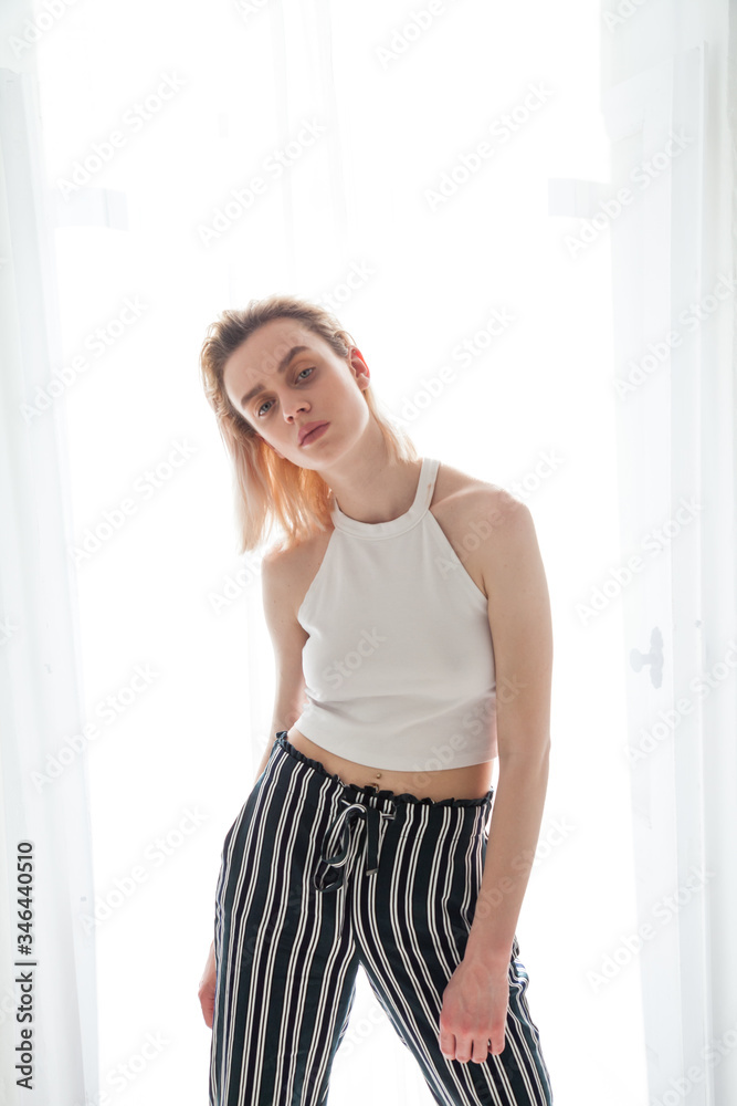 Portrait of a beautiful fashionable blonde woman in summer things Portrait of a beautiful fashionable blonde woman in summer things