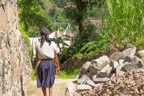 Humble woman with a headscarf in the a country town on the island of Santo Antao in Cape Verde on 10/02/2017