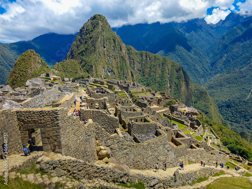 the east side view from the agriculture terraces over the lost inca ruin of Machu Picchu at sunset, Cusco, Peru.