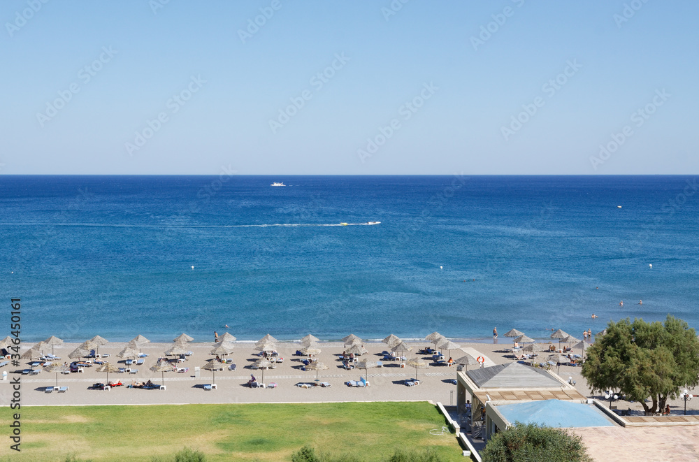 Panoramic landscape of Faliraki touristic hotel resort on Rhodes Island in Greece. Sandy beach seascape view from above.
