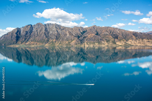 Reflection of lake Hawea in South island  New Zealand
