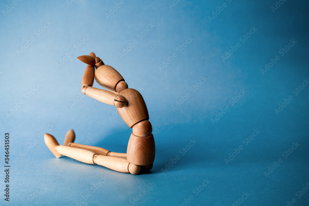 Violence and manipulation. sad wooden dummy