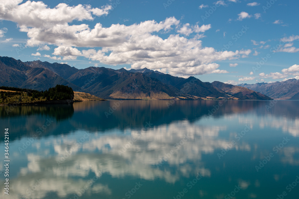 Reflection of lake Hawea in South island, New Zealand