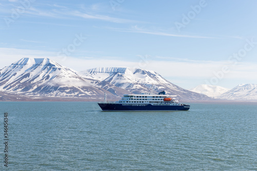 Expedition ship in Arctic sea, Svalbard. Passenger cruise vessel. Arctic and Antarctic cruise.