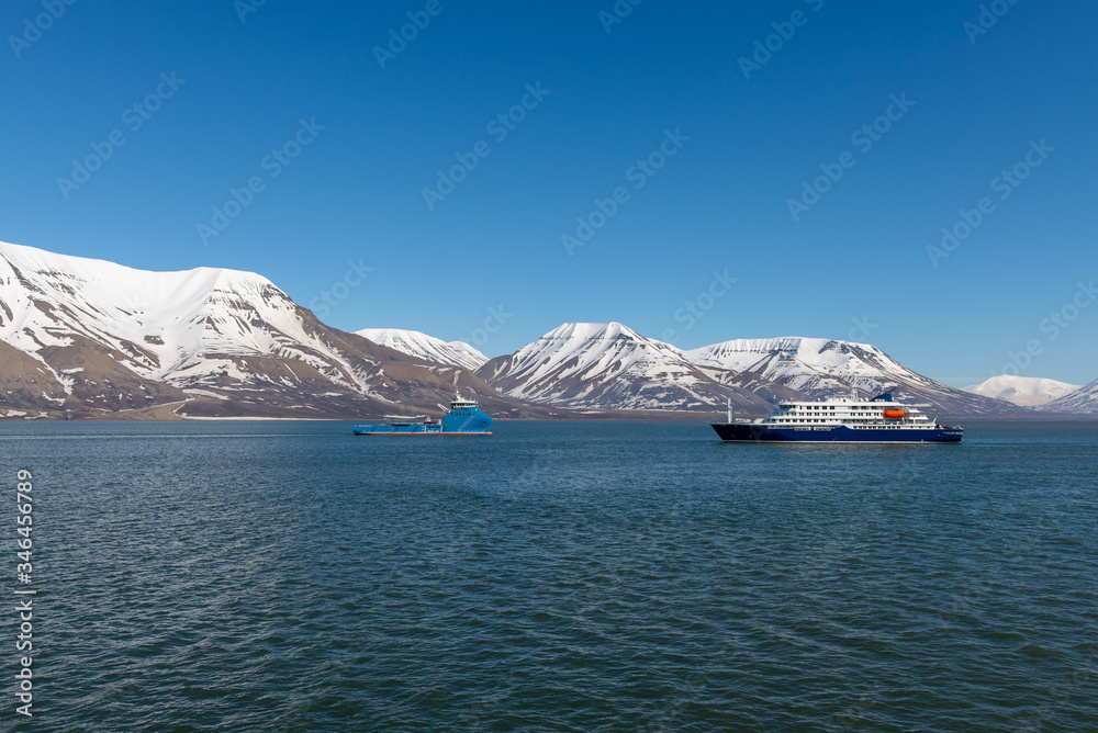 Expedition ship in Arctic sea, Svalbard. Passenger cruise vessel. Arctic and Antarctic cruise.