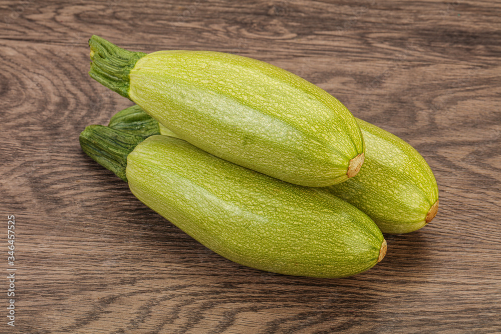 Young tasty zucchini over board Young tasty zucchini over board