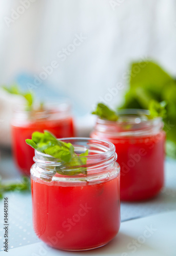 Wallpaper Mural Glasses of homemade cold juice with mint with fresh berries on a light background. Selective focus. Torontodigital.ca