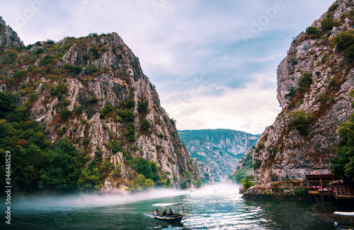 Canyon Matka near Skopje with people kayaking and amazing foggy scenery