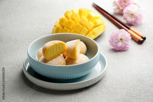 mochi ice cream with mango, traditional japonese rise sweets photo