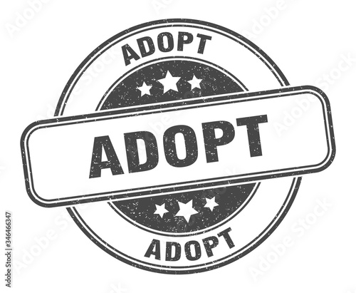 adopt stamp. adopt round grunge sign. label