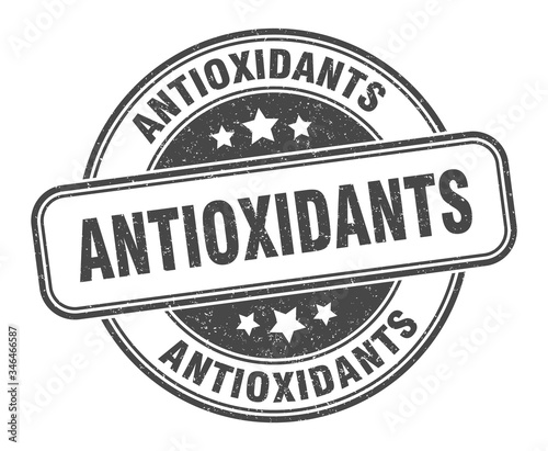 antioxidants stamp. antioxidants round grunge sign. label
