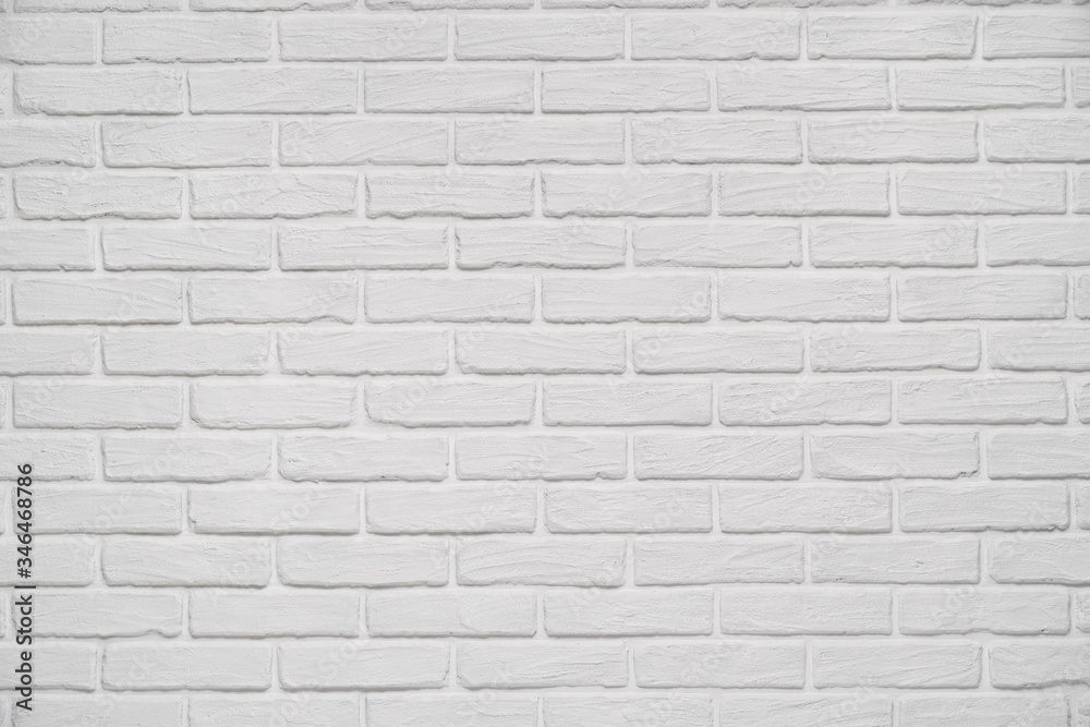 A white indoor brick wall abstract background or texture, new and clean, studio shoot - obrazy, fototapety, plakaty 