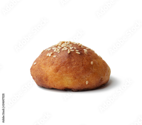 baked round bun with sesame seeds isolated on a white background