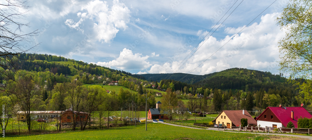 Krasna village with hills of Moravskoslezske Beskydy mountains around in Czech republic