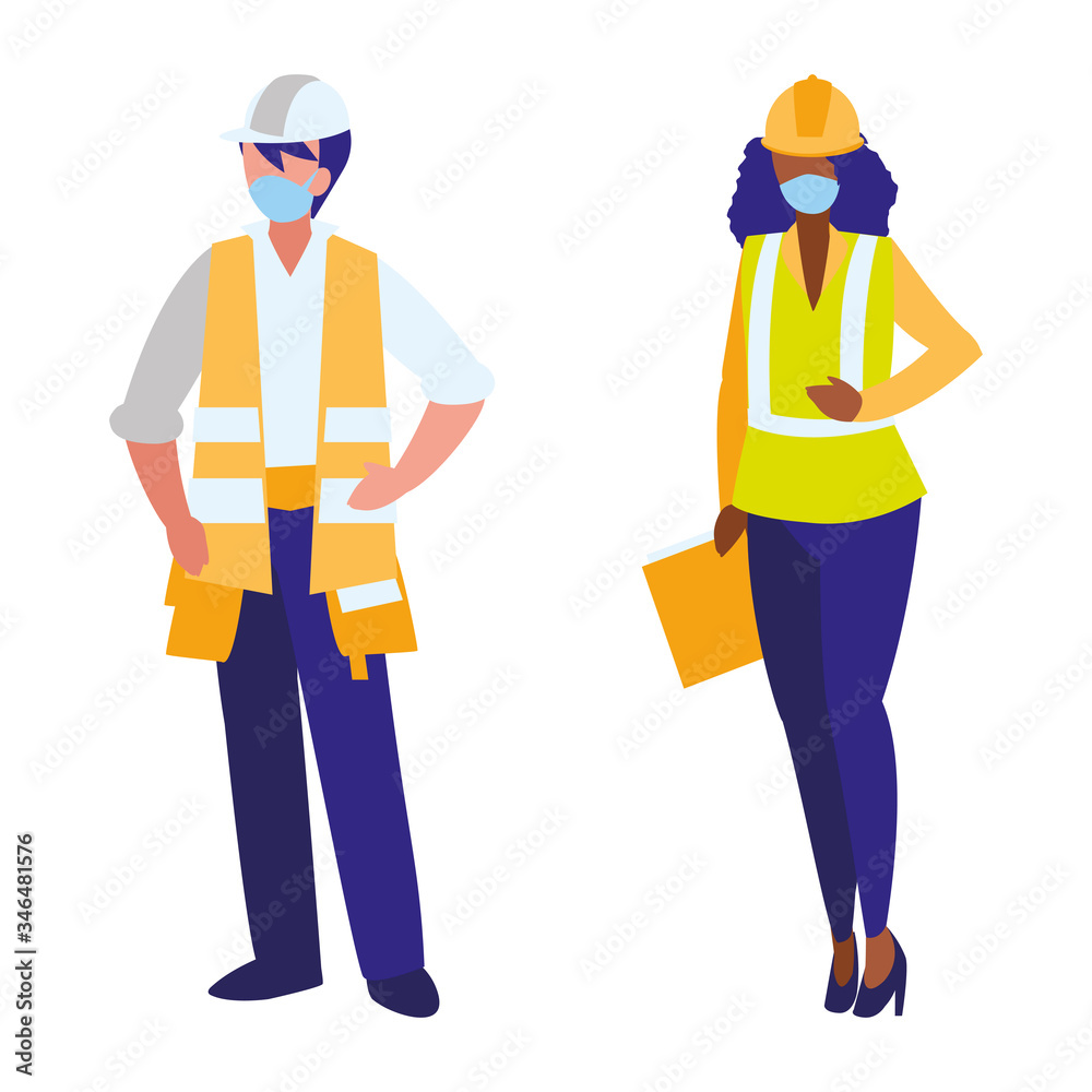 Industrial workers couple working with face mask Industrial workers couple working with face mask