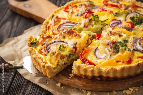 Homemade quiche with vegetables and cheese, vegetarian food.